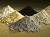 small piles of different colored rare-earth elements