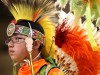 youth in Native American headdress