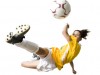 girl kicking soccer ball
