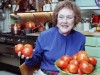 Julia Child displaying homegrown tomatoes