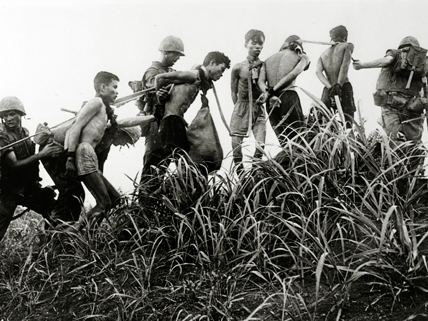 US marines with captured Vietcong guerrillas