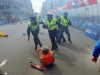 fallen runner and police near finish line of 2013 Boston Marathon